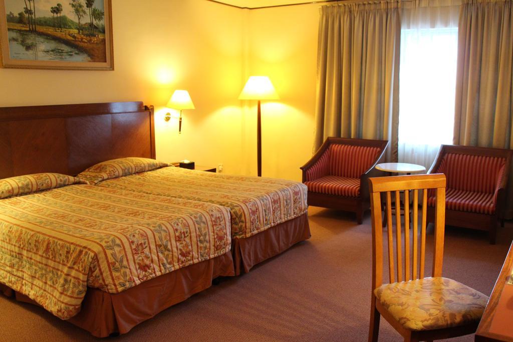Holiday Villa Hotel City Centre Phnom Penh Quarto foto